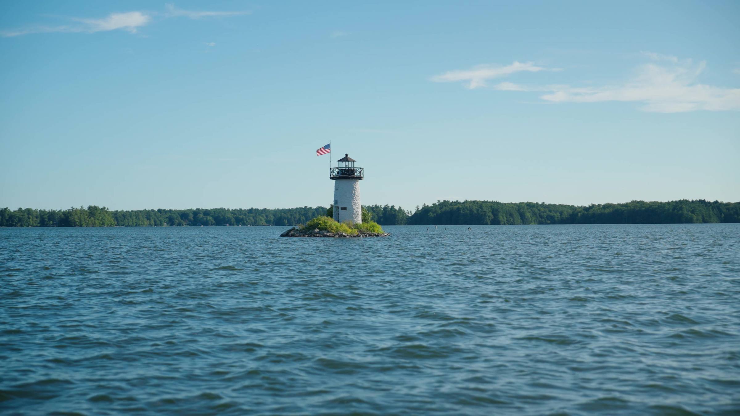 Ladies Delight Lighthouse, a stone light on a rocky island in Cobbosseecontee Lake, Maine